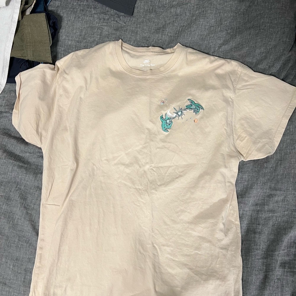 The Nike TEE. Worn one time, great condition I think I paid over 100 bucks.